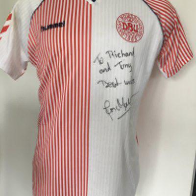 Jan Molby 1986 Denmark Match Worn Football Shirt: Hummel short sleeve XL shirt with navy blue number 7 to rear. Iconic shirt with half red and white narrow stripes. Signed and dedicated to vendors, who have been long term friends and associates of his club side Liverpool. Match unknown but Molby did wear this style shirt at the Mexico World Cup. Unwashed. Please note this shirt sold at last sale with a hammer price of two thousand pounds. Our vendor was paid but the winning bidder used a catalogue of excuses not to pay. This well known Denmark collector is now banned from using the saleroom. Please do not bid unless you have the funds to purchase.
