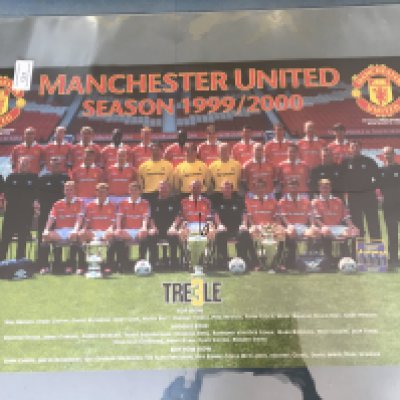 Manchester United Large Treble Team Football Poster: Mint condition poster in plastic cover measuring a massive 87 x 58cm. Depicts the squad with all 3 trophies in front of them before the 99/00 season.