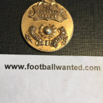 57/58 West Ham 2nd Division Winners Football Medal: Stunning gold medal with ring suspension awarded to trainer Billy Moore. Billy was part of the training team from 1929 to 1960 after formerly being a Hammers player. Unboxed.