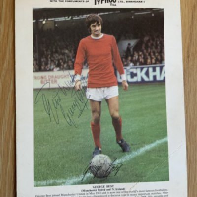 George Best Signed Manchester United Typhoo Tea Football Card: Hand signed 10 x 8 inch card neatly signed Best Wishes George Best in blue biro.