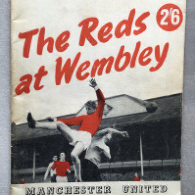 1963 Manchester United Signed FA Cup Brochure: 48 page The Reds At Wembley brochure signed under player profile by Charlton Herd Stiles Quixall Setters Giles Dunne Crerand Foulkes Gaskell Cantwell and Law.