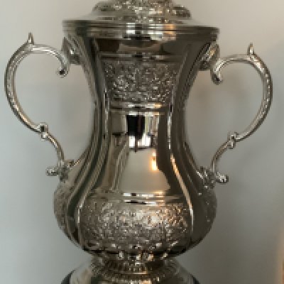 FA Cup Replica Football Trophy: Stunning full size, heavy FA Cup trophy in new condition. Superb item for promotional events or impressive display in a bar. Measures 2 feet 4 inches high (est 70cm). Exact with non removable lid so no accidents. The words Football Association Challenge Cup are not engraved for copyright purposes, but there is no mistaking this famous trophy.