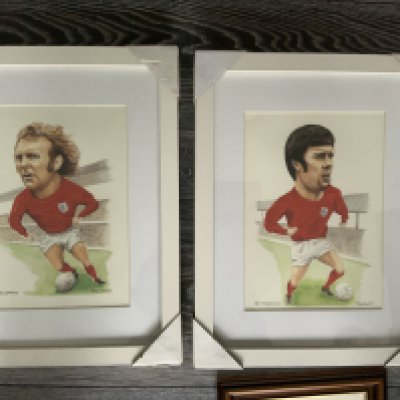 Hurst+ Moore West Ham Framed Football Prints: Two large, nicely framed caricatures of Hurst + Moore in the red World Cup winning kit. C/W a duplicate Moore in a lesser frame and one more. Instructions to sell. (4)