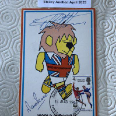 Hurst + Peters Signed 1966 World Cup Willie Postcard: Original unwritten postcard with FA 1966 to rear and stamped Cameo Stamps Ltd. WC Willie has first day of issue England Winners stamp 18 8 1966 and is hand signed by both goalscorers.