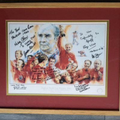 England 1966 World Cup Winners Signed Display: Attractive print professionally framed and signed by 9 of the winning team lacking both Bobbys. What sets this apart from others is that every autograph is undedicated and has a message. Roger Hunt has written it was definitely in Geoff, Stiles added The year football came home 1966, Hurst added a lucky shot Geoff and Cohen says I was forty yards away and I thought it was certainly in. Interesting item measuring 25 x 20 inches.