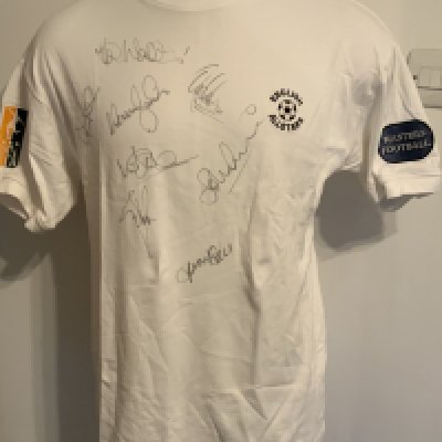 England All Stars Match Worn Signed Football Shirts: White short sleeve with autographs including Viv Anderson, Lee Sharpe, Paul Walsh, Steve Bull, Bob Boulder and Ruel Fox. C/W red away shirt. Both are number 4 issued to Jason Dozzell. Masters Football + PFA to arms. (2)