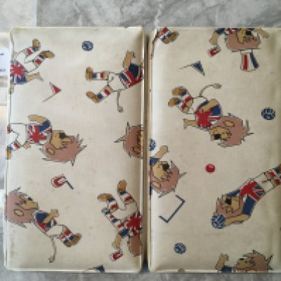 1966 Football World Cup Willie Seat Cover: Superb foldable seat cover to put on your seat for more comfort at the match. Features WC Willie with both carrying handles still intact.