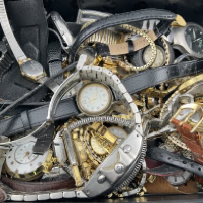 A box of mixed watches. Postage category B.