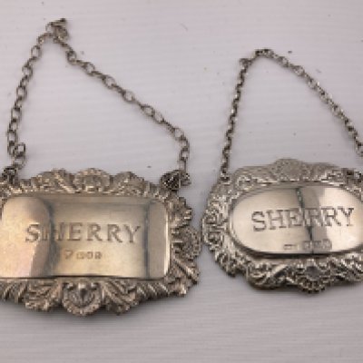 Two silver sherry decanter labels. Postage category A.