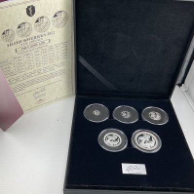 A proof 2022 silver 5 coin sovereign set with certificates. Postage category B.