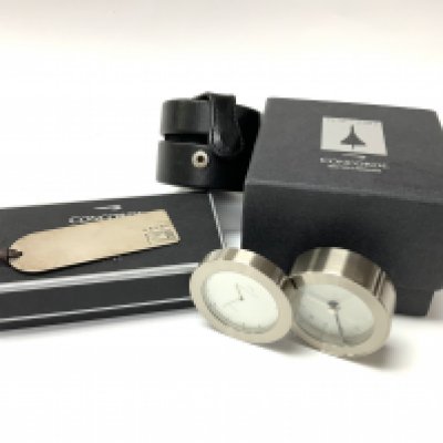 A boxed Concord hallmarked silver bookmark by CARRS together with a Concord cased travel clock. (B)