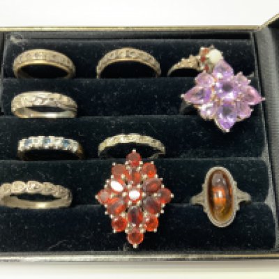 A small collection of silver, silver and stone set rings etc. (10), postage Catagory A.