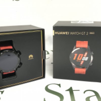 Boxed smart watches including a Huawei GT2 (seen working) and a Sunto core watch. Postage category B
