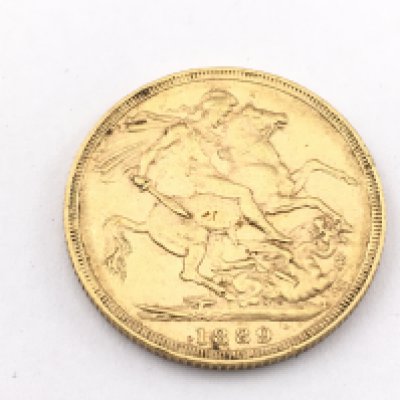 An 1889 full sovereign. Postage A