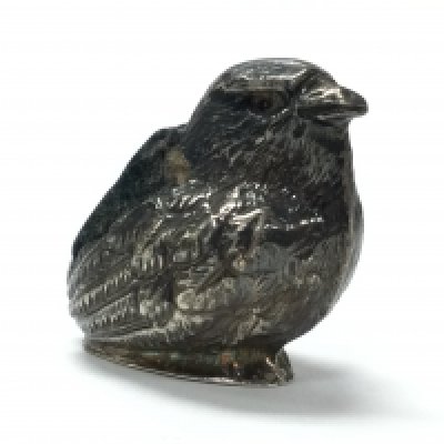 A 1906 silver Chester hallmarked bird pin cushion by Sampson and Mordan. 3.5cm tall. Postage category A