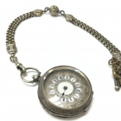 A silver hallmarked cased pocket watch with attached silver albertina. Postage category a