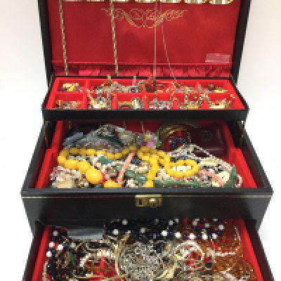A box of costume jewellery including some silver, necklaces, rings etc. postage category B