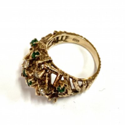 A 1970s cluster design 9ct gold emerald and diamond ring, 7.34g, Size N.5 (A) (1 stone missing).