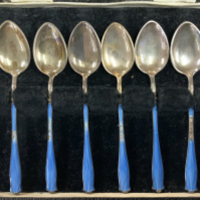 A cased set of Hallmark Silver Guilloche enamel teaspoon set, some damage to the enamel (A)