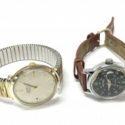 Mens vintage Manual wind watches comprising a Swiss Larex Discovolante 17 jewel watch, 35mm case and a Salvest Anti Magnetic watch. Both seen working. Postage category A