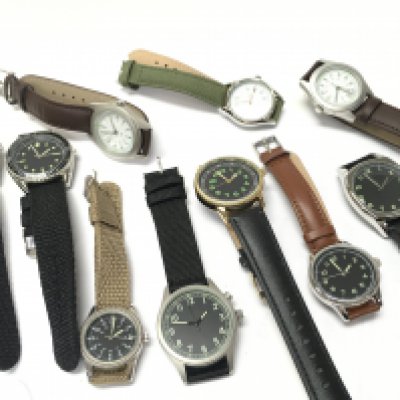 A Collection of military style quartz watches, all seen working. Including US, Czech, Swedish styles etc. postage category B