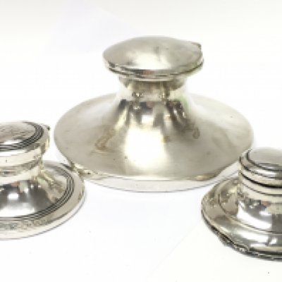 Three silver hallmarked inkwells, total weight 601g