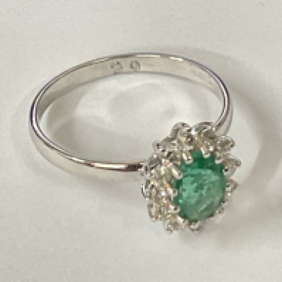 Certificated 18ct white gold oval emerald and RBC diamond cluster ring. Emerald 0.90ct. Diamonds 0.32ct. Cert no. WG19634154135. Ring size approx M/N. Postage category A.