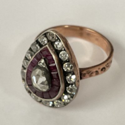 Certificated vintage style 8ct rose gold (silver top) pear shaped ring set with pear shaped rose cut diamond (0.45ct), mixed rectangular cut rubies (0.45ct) and old European cut diamonds (0.80ct). Cert no. WG19624144935. Approx ring size L/M. Postage category A.