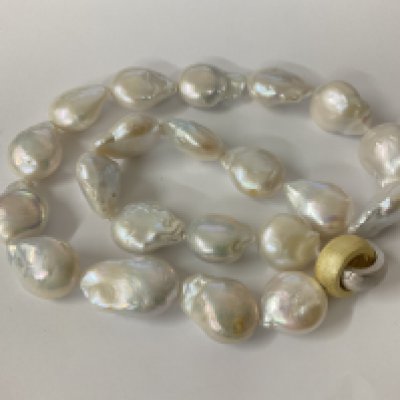 Baroque Pearl necklace with brushed gold plated and silver hooped clap. Postage category A.