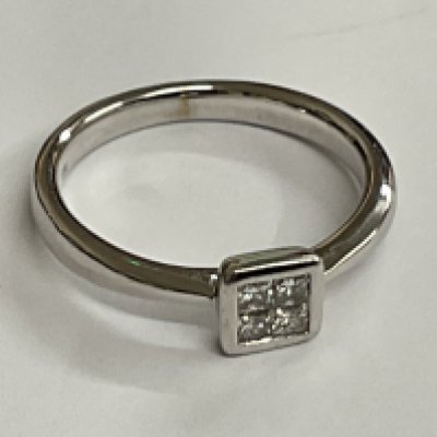 9ct white gold 4 diamond invisible set ring. Princess cut diamonds 0.32ct approx. Ring size approx L/M. Postage category A.