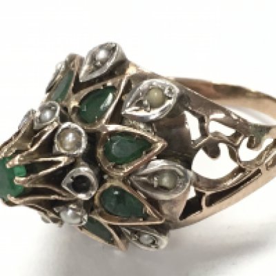 A 9ct gold emerald and pearl set dress ring , size J/K. Total weight 5.8g Postage category A