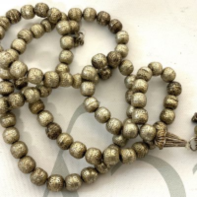 An Eastern white metal necklace. (A)