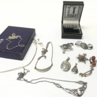 WITHDRAWN - A Collection of Mackintosh jewellery including some silver pieces and some silver chains. Postage category B