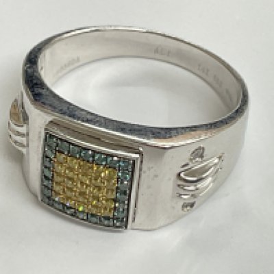 14ct white gold colour treated diamond ring, with 4 diamonds mounted in the shoulders. 0.50ct, 9.36g. Approx ring size U. Postage category A.