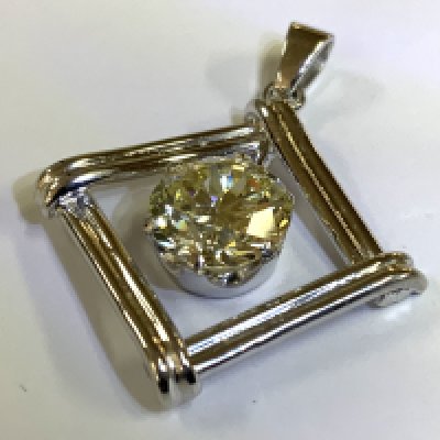 A single 2.05ct round brilliant cut diamond, Colour O/P, Clarity VS2 ( stone measurements 8.17-8.30 x 4.85mm. Mounted in an 6 claw 9ct white gold pendant mount with a 14ct gold rope necklace. (A)