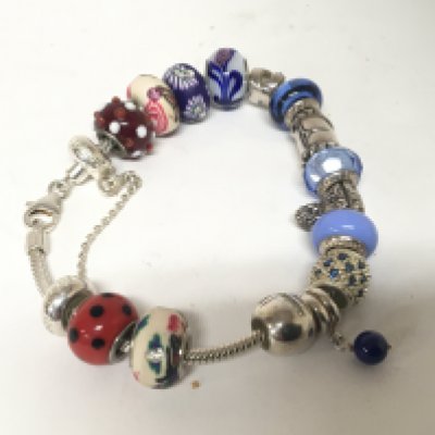 A Links of London silver bracelet with coloured beads.