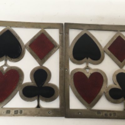 A pair of silver and enamel playing card box mounts London hallmarks maker SM&Co slight damage to enamel. 9.7cm x 7.5cm