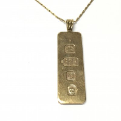 A 9ct gold ingot on 9ct chain. Total weight 13.50g. Postage A