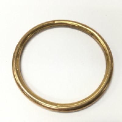 A 9ct gold bangle. 9cm diameter and 13.75g Postage A