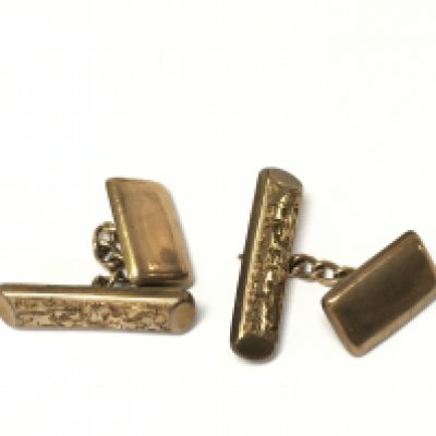 A pair of 9ct gold cufflinks. Postage B