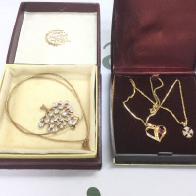 A silver gilt 'tree of life' pendant on chain silver gilt heart pendant and one other. Shipping category A.