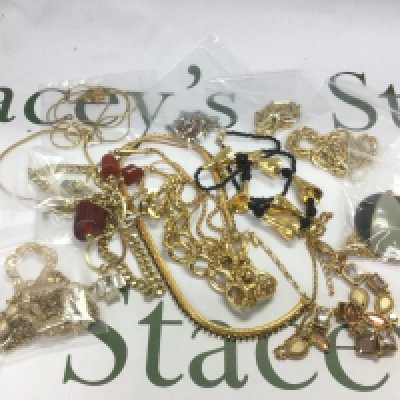 A collection of mainly gold tone necklaces. Shipping category A.