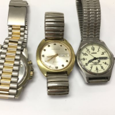 Two vintage automatic watches and one other. Postage B