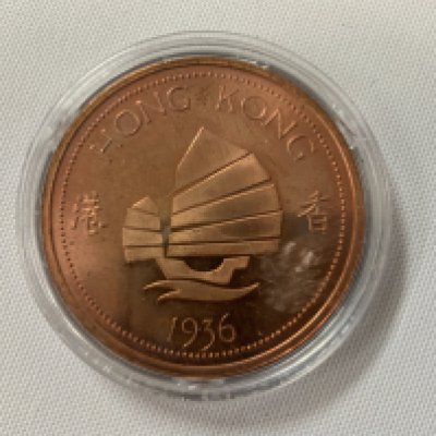 A small groups of world coins including a Edward VII fantasy coin.