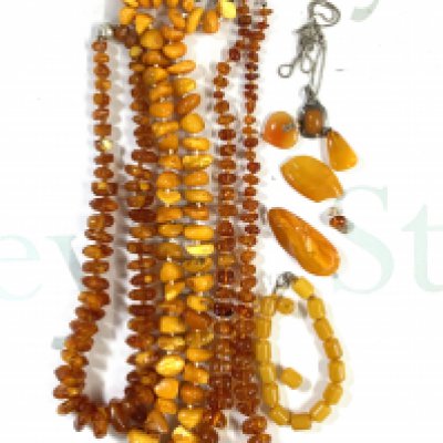 A collection of Amber beaded jewellery. (A)