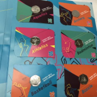 A complete london 2012 Olympic 50p collection including completer medal. Postage B