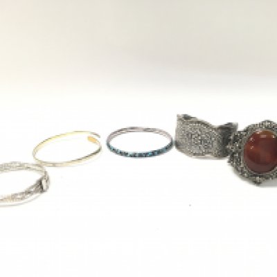 Eastern and silver bangles. Postage category A NO RESERVE