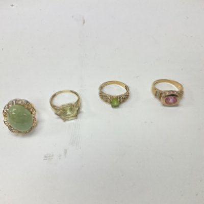 Four 9ct gold stone set rings, approx approx weight 15.92 grams.