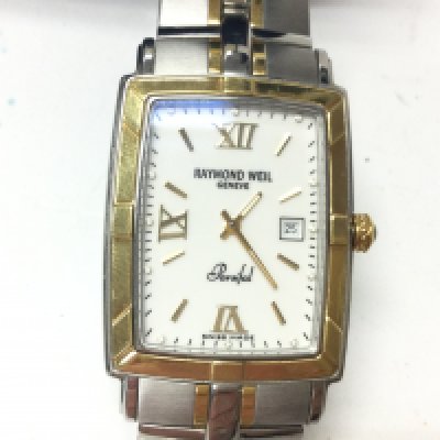 A Raymond Weil Parsifal watch with box and papers. Postage B