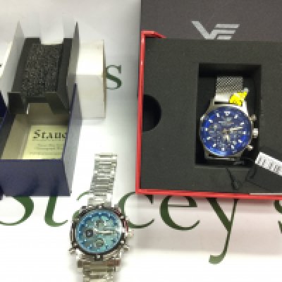 Two gents Chronograph watches including a Vostok Europe and a stauer (link end damaged). Both with boxes and paperwork and seen running. Postage B